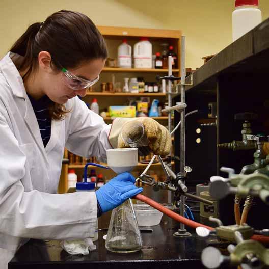 A student working in Chemistry class